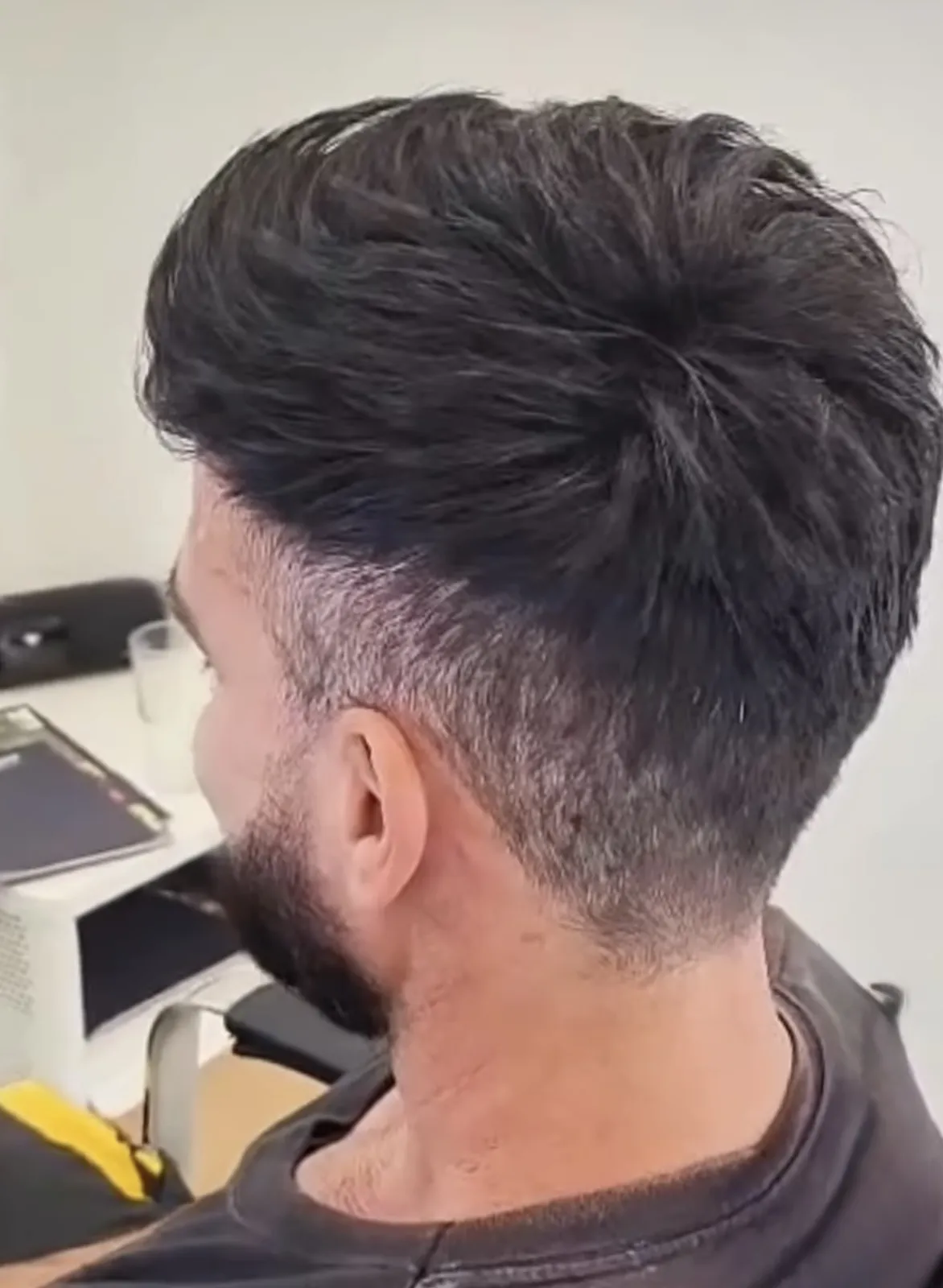 Real HEADS client — full density styled hair after his hair system, side view